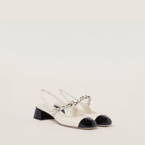 Miu Miu Leather and patent leather slingback pumps