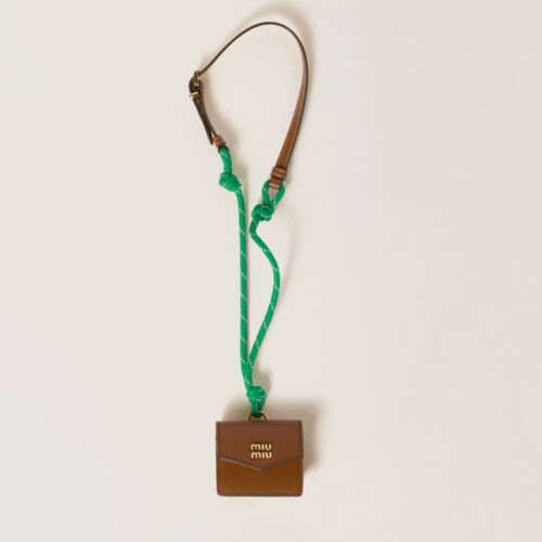 Miu Miu Leather cord and metal trick with mini-pouch